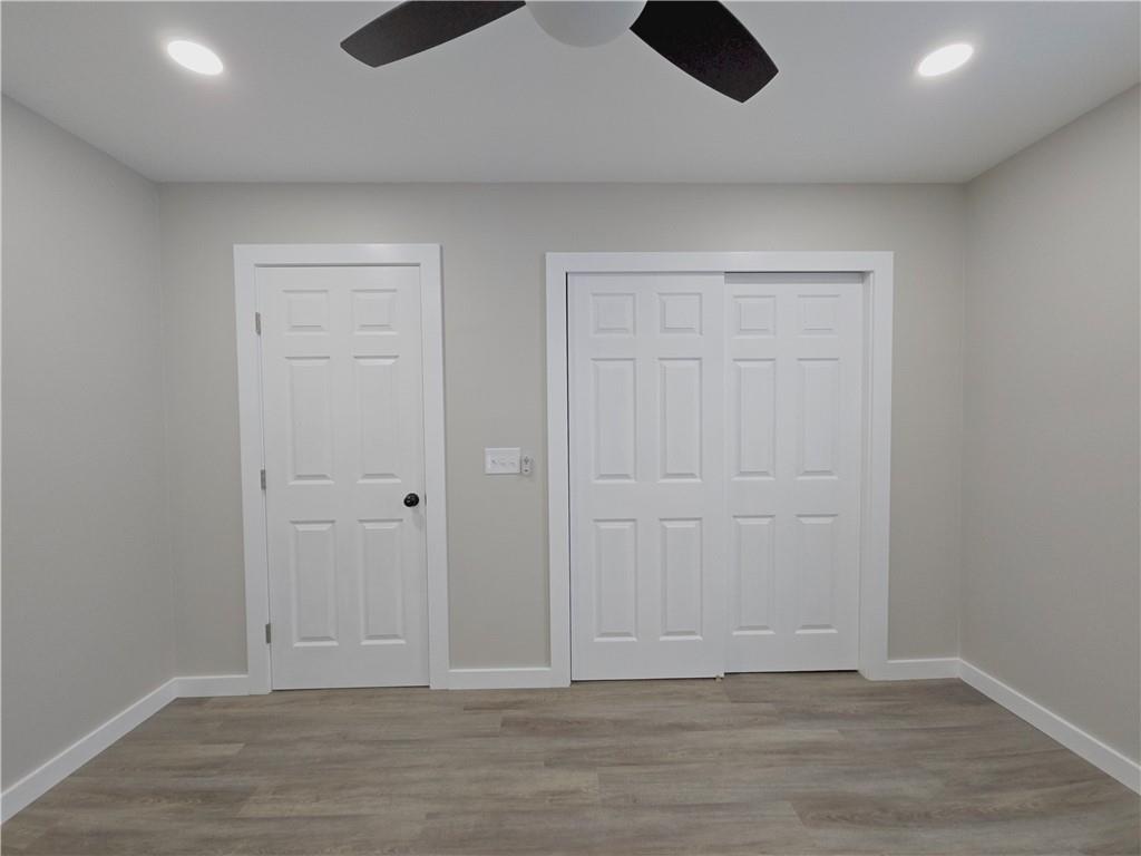 4161 Maple Street Hawthorn, PA 16230 - Photo 18 of 27 an empty room with wooden floor and windows