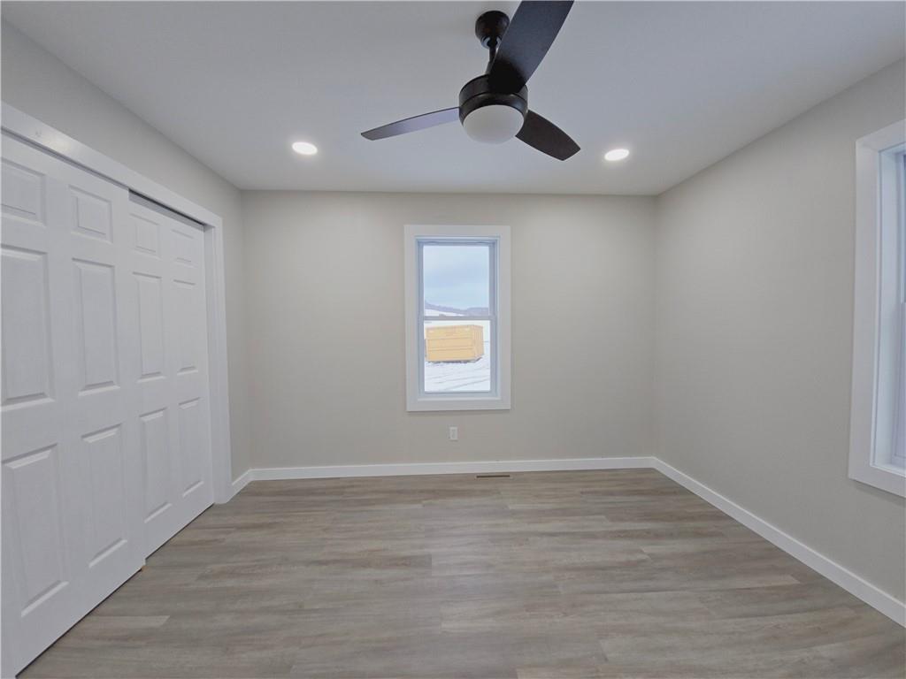 4161 Maple Street Hawthorn, PA 16230 - Photo 20 of 27 wooden floor in an empty room with a window