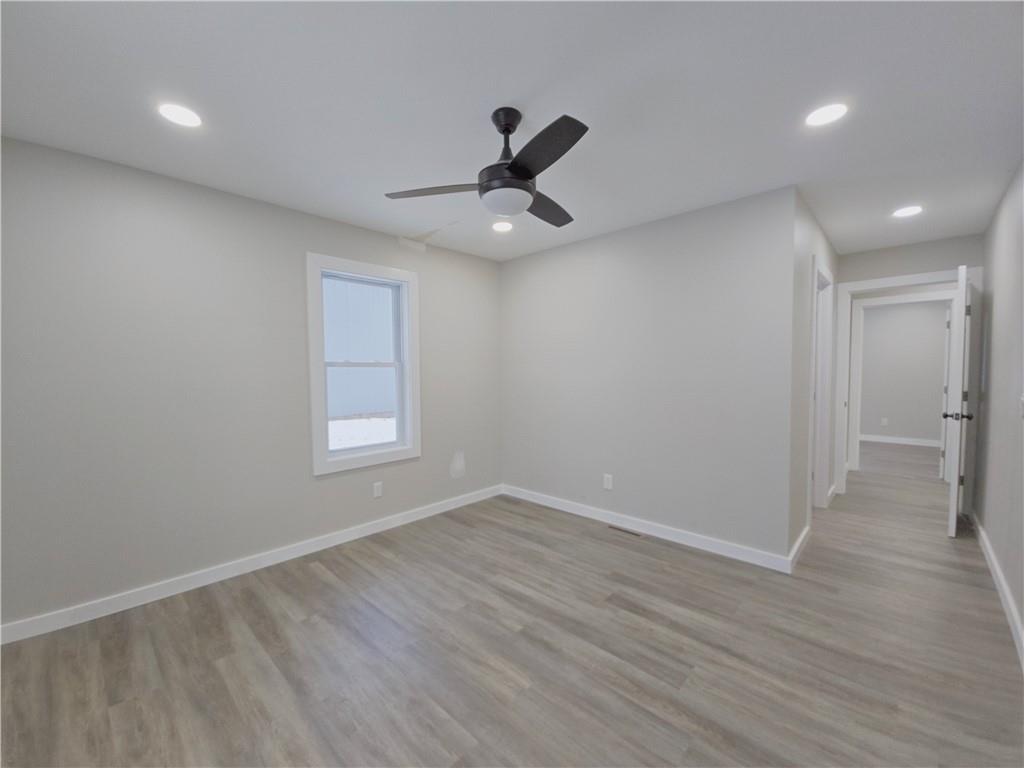 4161 Maple Street Hawthorn, PA 16230 - Photo 22 of 27 wooden floor in an empty room with a window