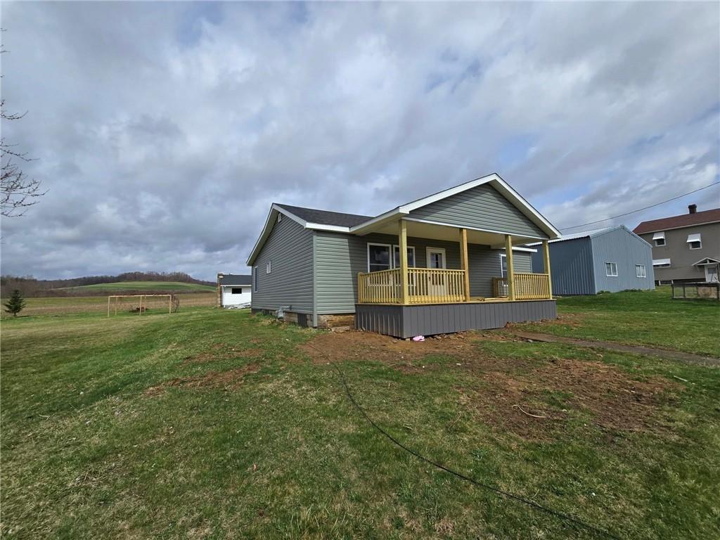 4161 Maple Street Hawthorn, PA 16230 - Photo 5 of 27 a view of a house with a yard