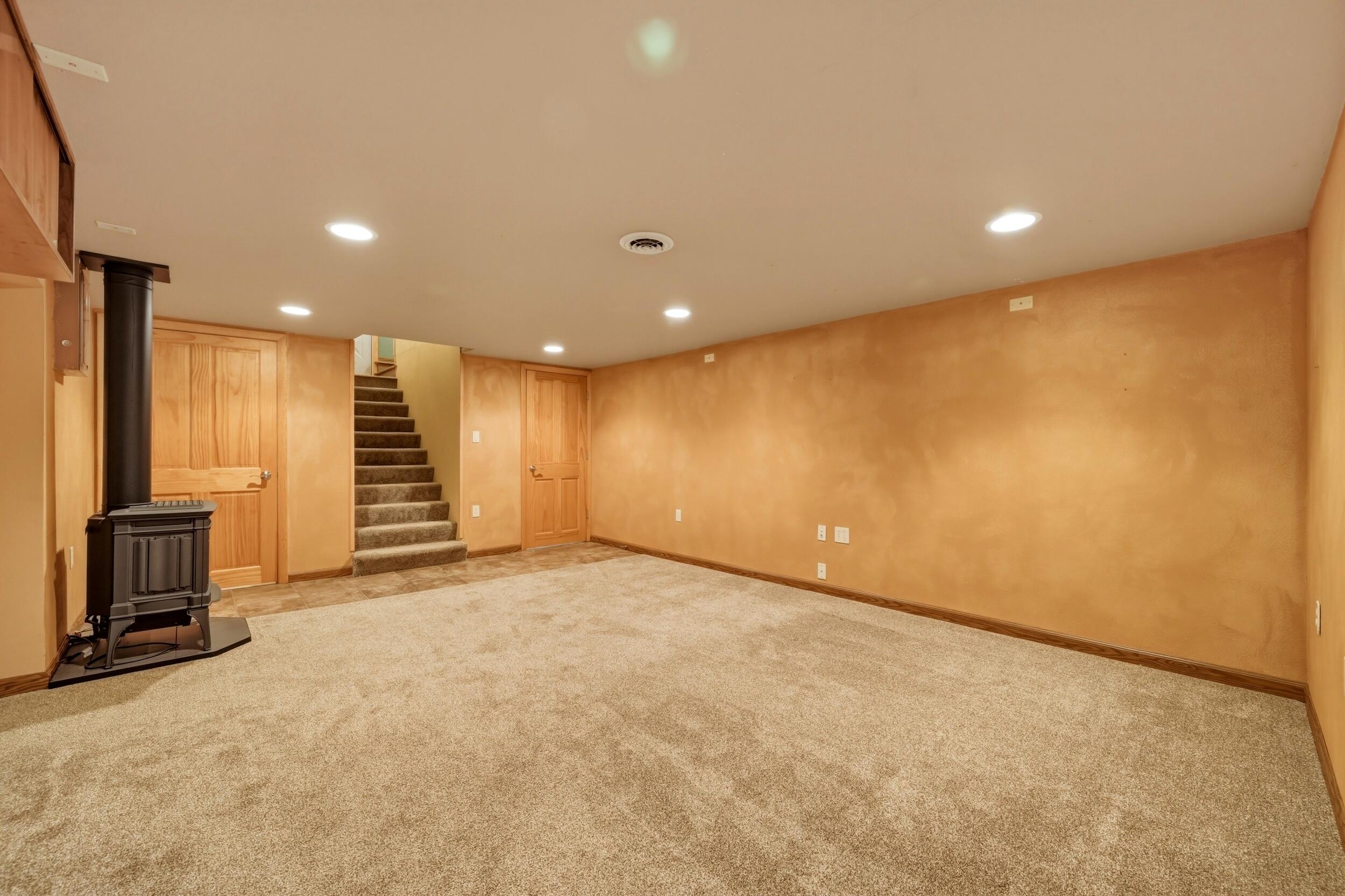157 Upper Prairie Dog Road Banner, WY 82832 - Photo 51 of 71 152 Family room basement