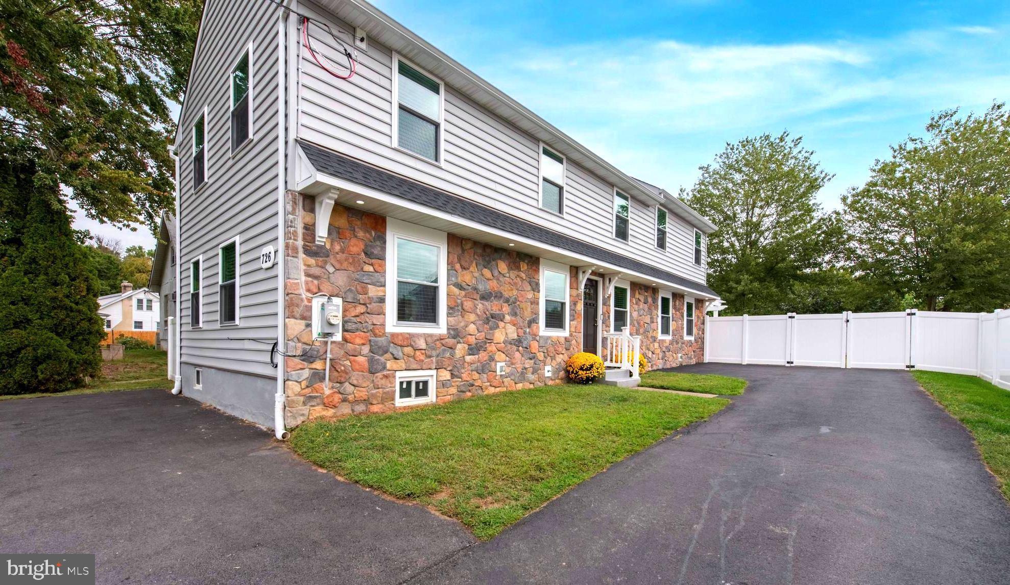 Stone, new siding and corbels add curb appeal