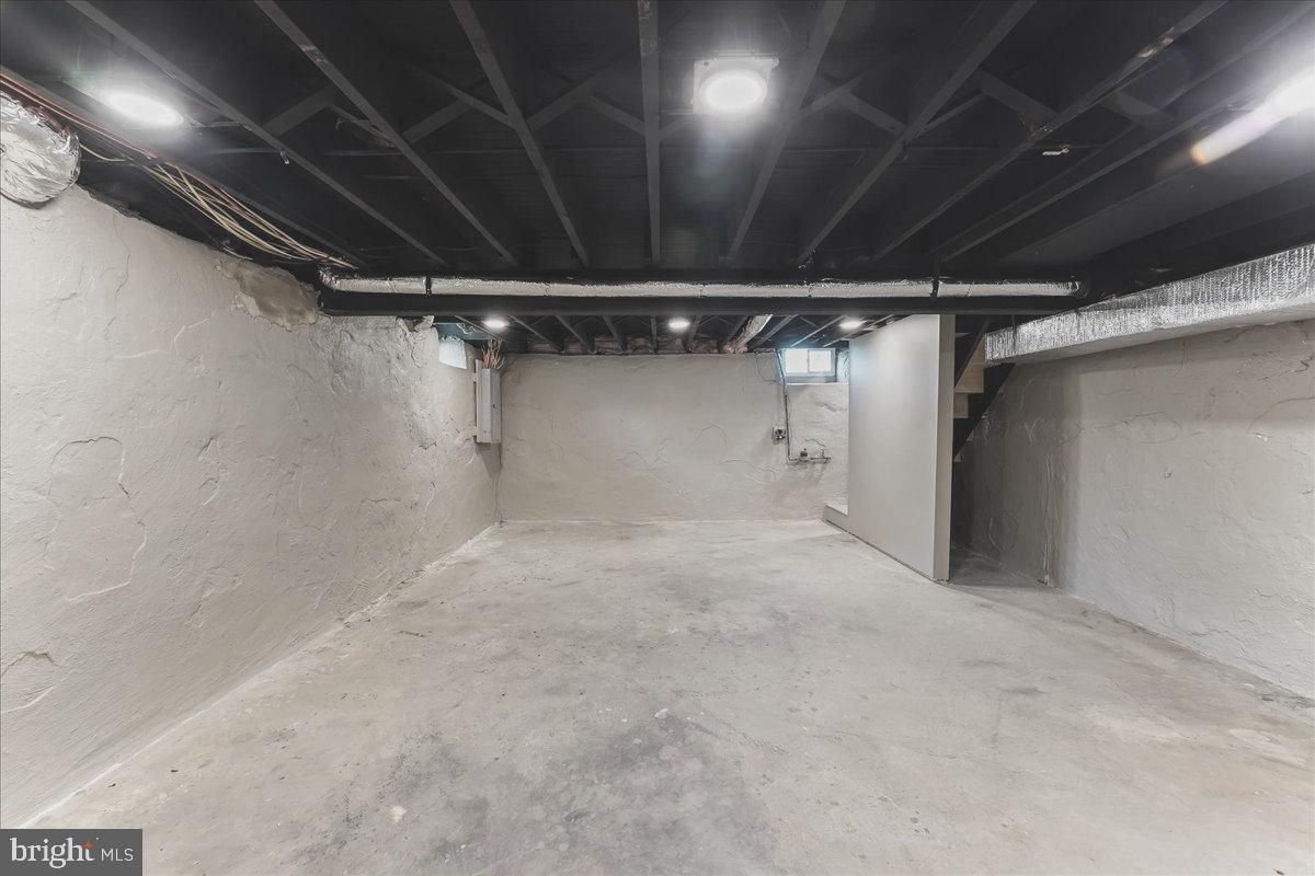 726 Brookhaven Road Wallingford, PA 19086 - Photo 24 of 30 Clean Basement - walls / beams painted & well lit