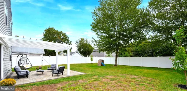 a house view with a outdoor space