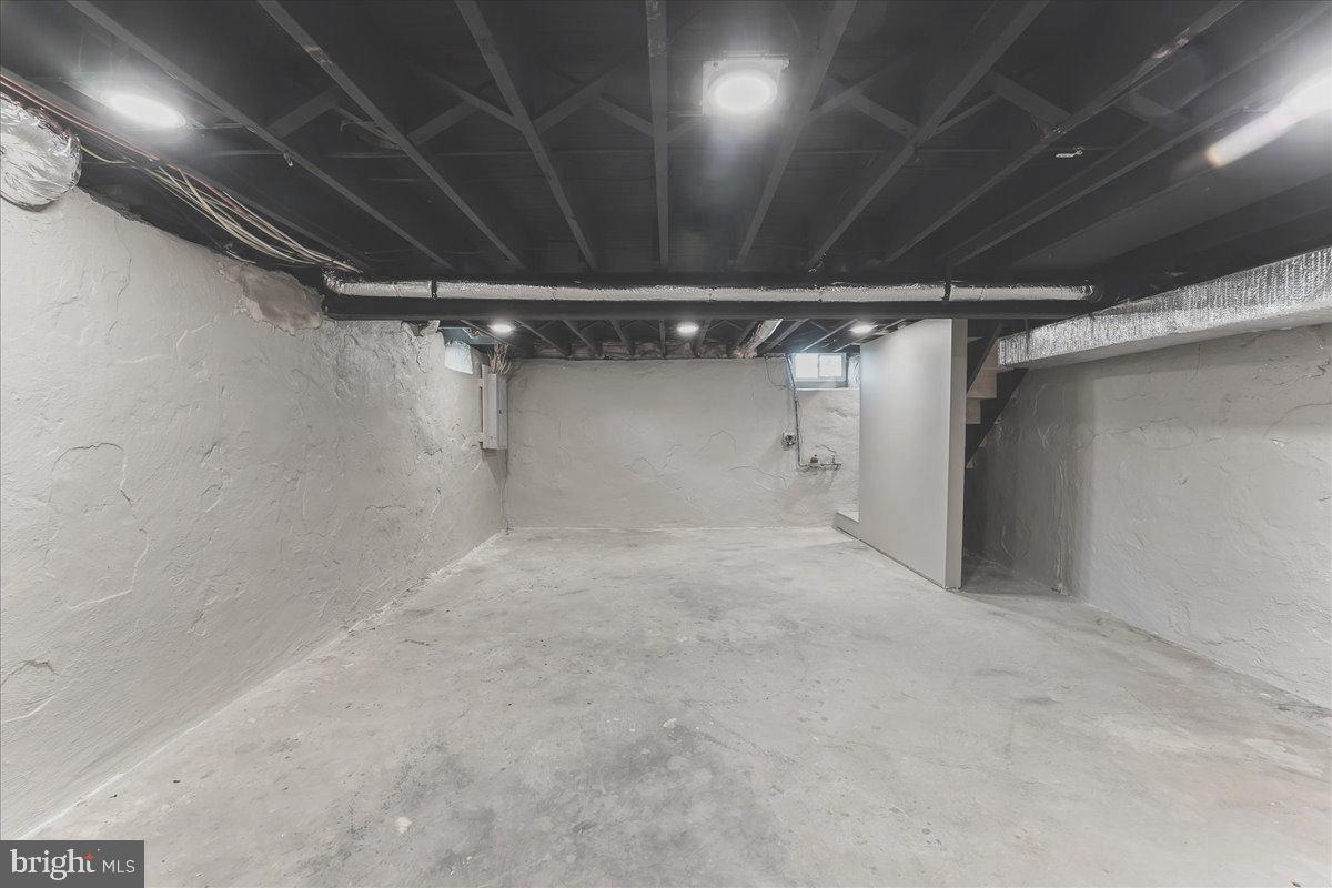 726 Brookhaven Road Wallingford, PA 19086 - Photo 29 of 30 Clean Basement - walls / beams painted & well lit