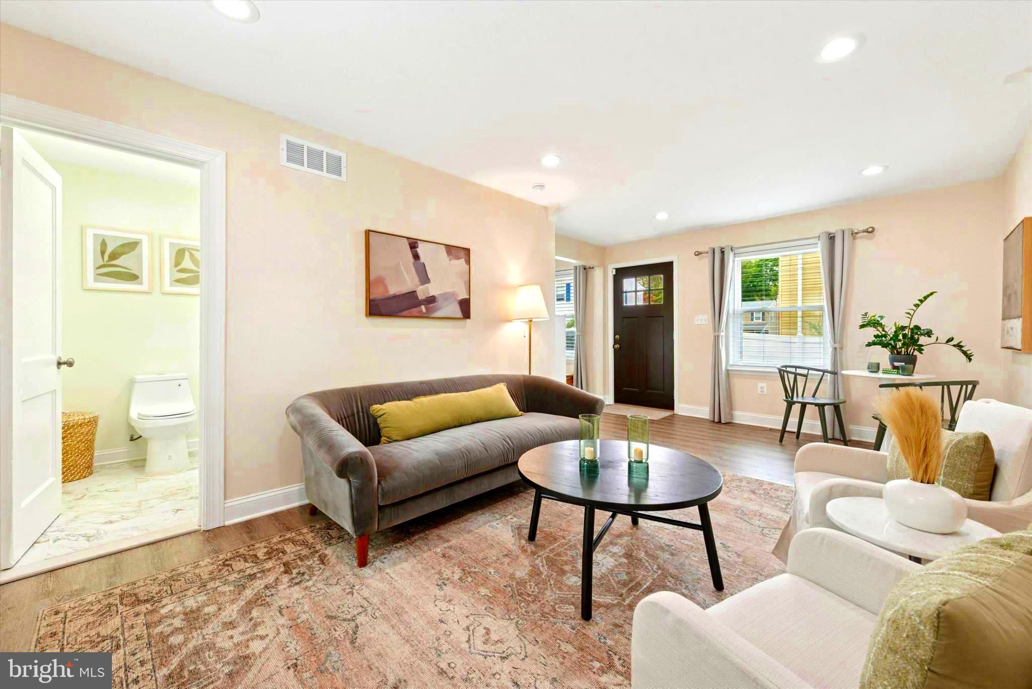 726 Brookhaven Road Wallingford, PA 19086 - Photo 5 of 30 Living Room + 1/2 Bath view to Entry