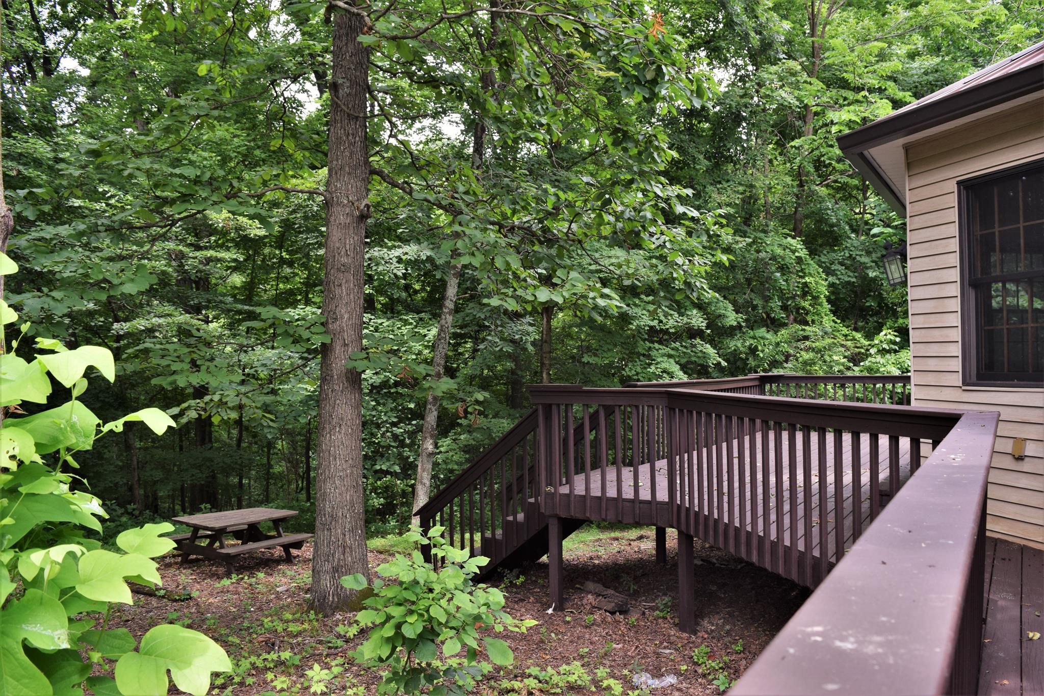 3195 Friendship Road Cross Plains, TN 37049 - Photo 6 of 22 a view of a chair and table in the balcony