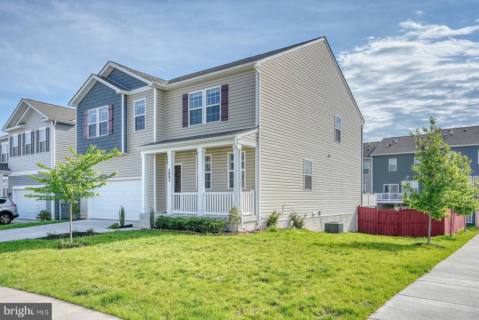 2085 Pomona Way Frederick, MD 21702 - Photo 12 of 53 Charming home with lush green lawn.