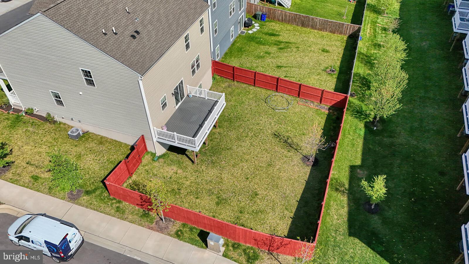 2085 Pomona Way Frederick, MD 21702 - Photo 51 of 53 Spacious backyard with vibrant greenery.
