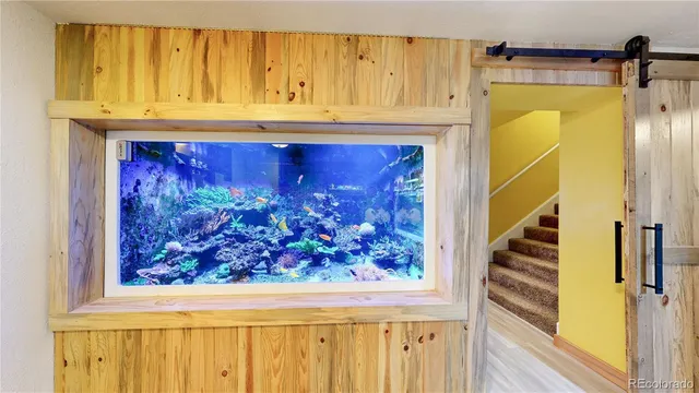 a view of a door with wooden walls