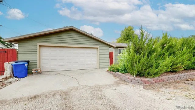 an aerial view of houses with yard