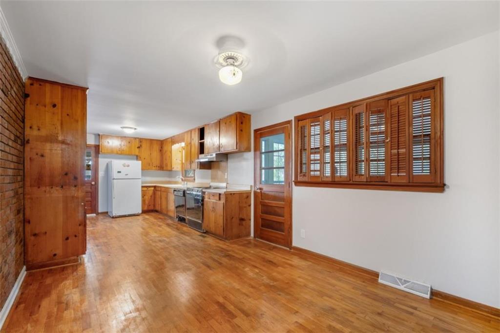 14 Mitchell Circle Southeast Rome, GA 30161 - Photo 24 of 39 a view of a kitchen with furniture and a kitchen