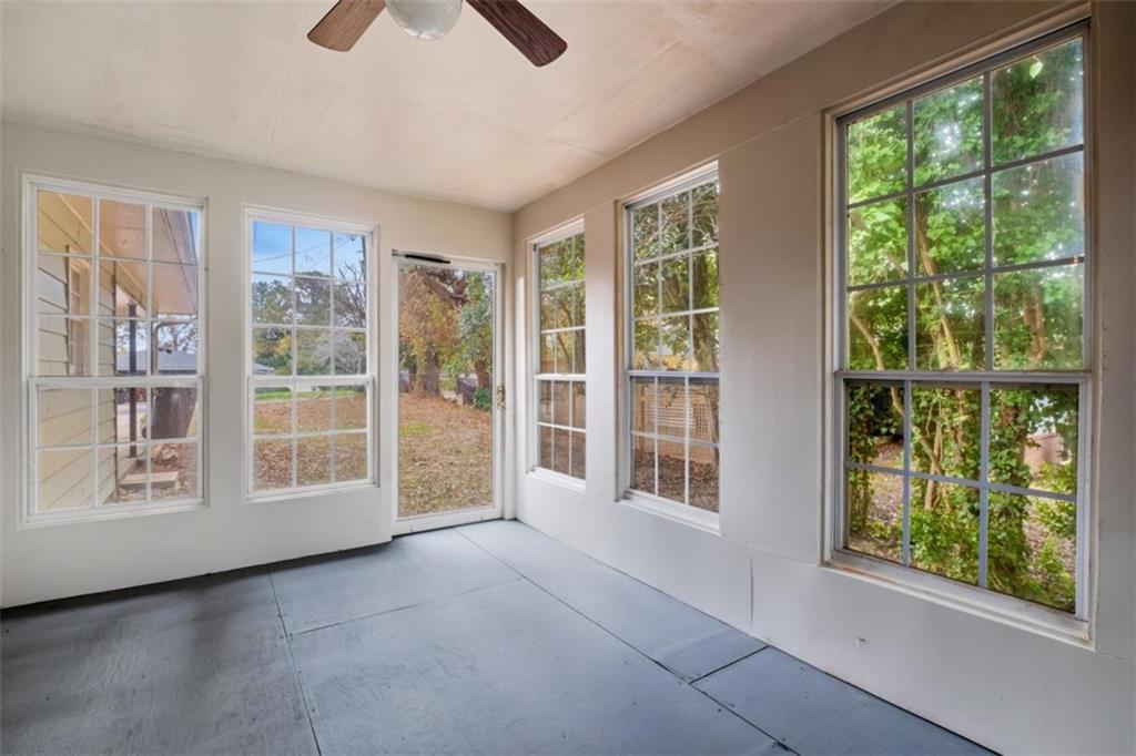 14 Mitchell Circle Southeast Rome, GA 30161 - Photo 30 of 39 a view of an empty room with a window and balcony view