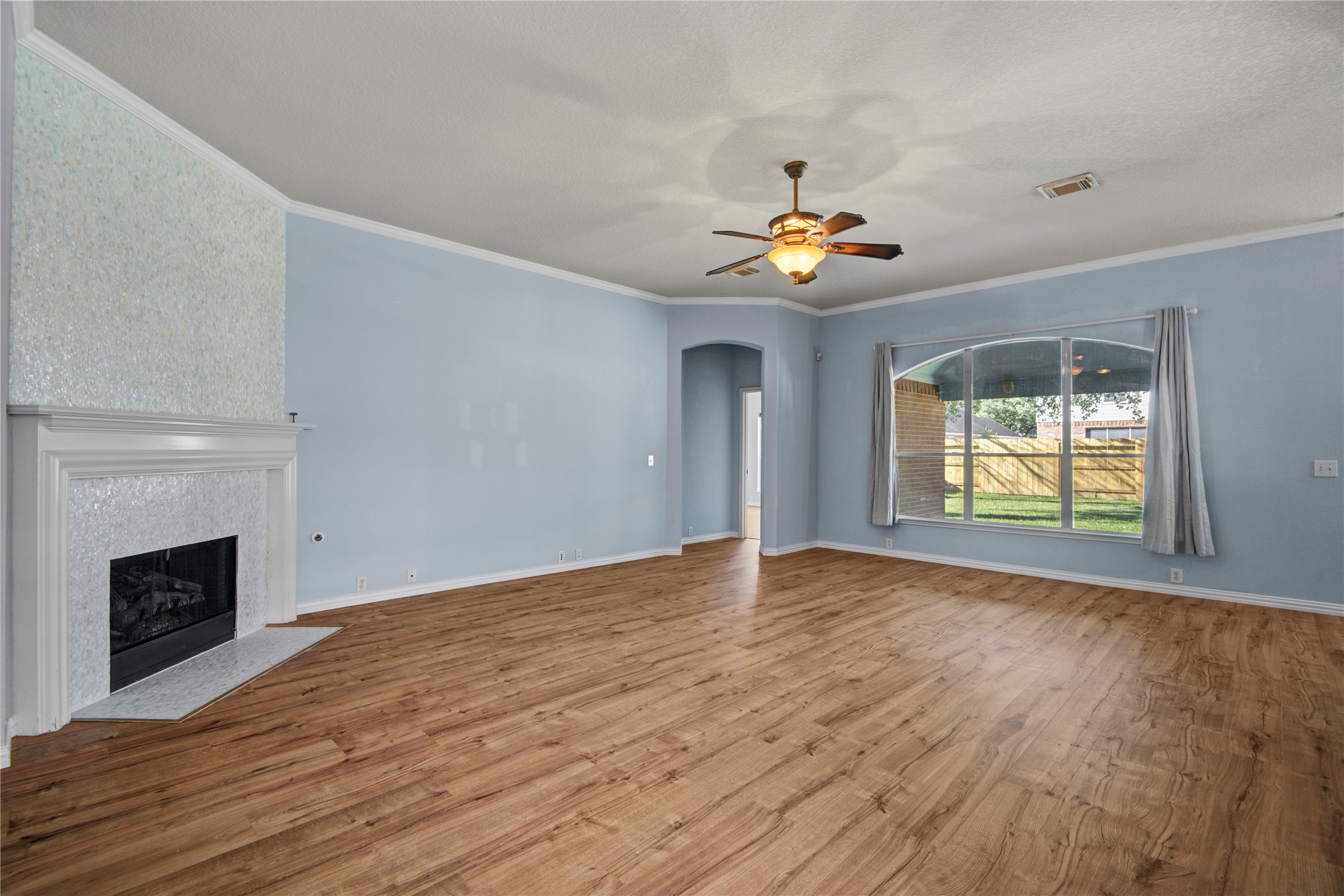 2206 Louetta Brook Lane Spring, TX 77388 - Photo 15 of 39 a view of an empty room with window and wooden floor