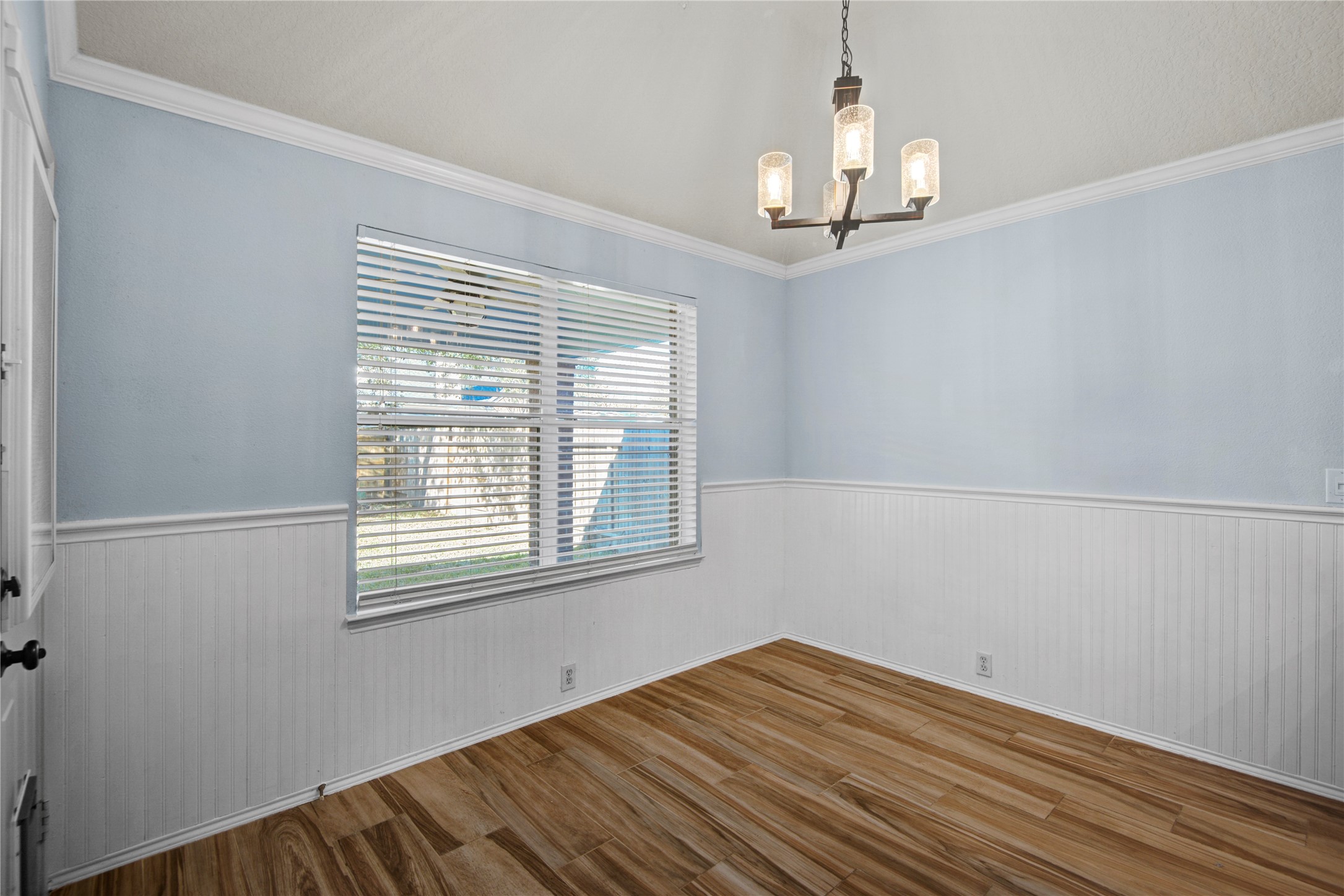 2206 Louetta Brook Lane Spring, TX 77388 - Photo 26 of 39 a view of empty room with wooden floor and fan