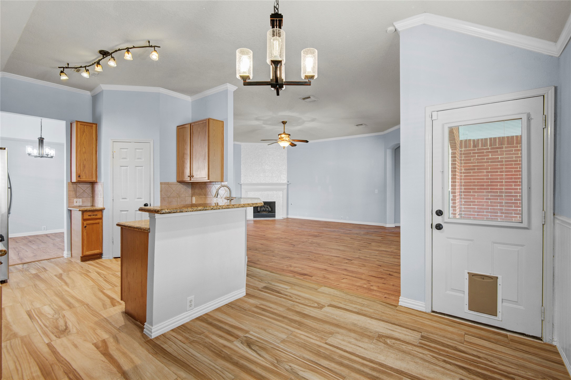 2206 Louetta Brook Lane Spring, TX 77388 - Photo 27 of 39 a room view with wooden floor and ceiling fan