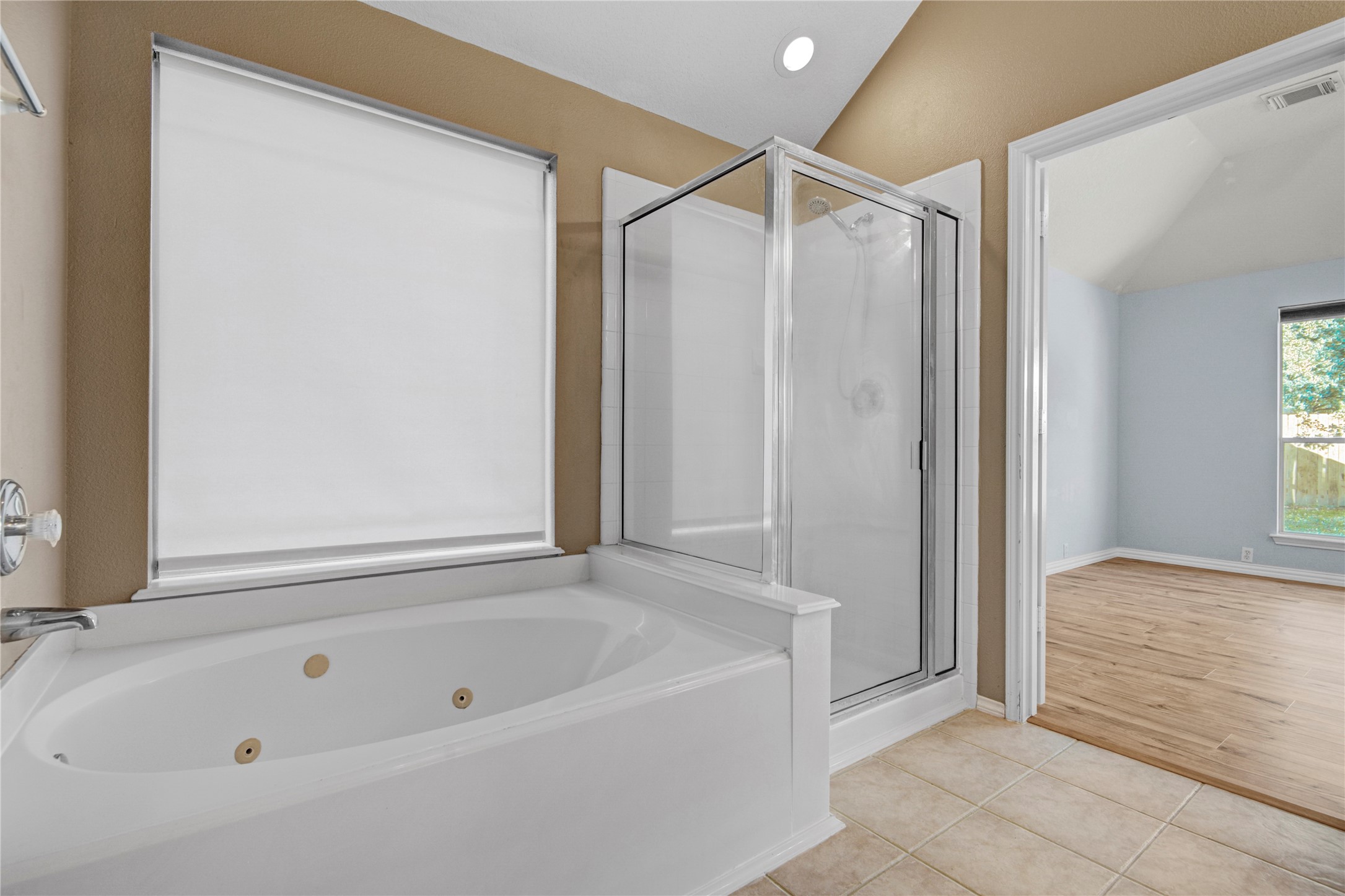 2206 Louetta Brook Lane Spring, TX 77388 - Photo 32 of 39 a bathroom with a tub shower and a sink