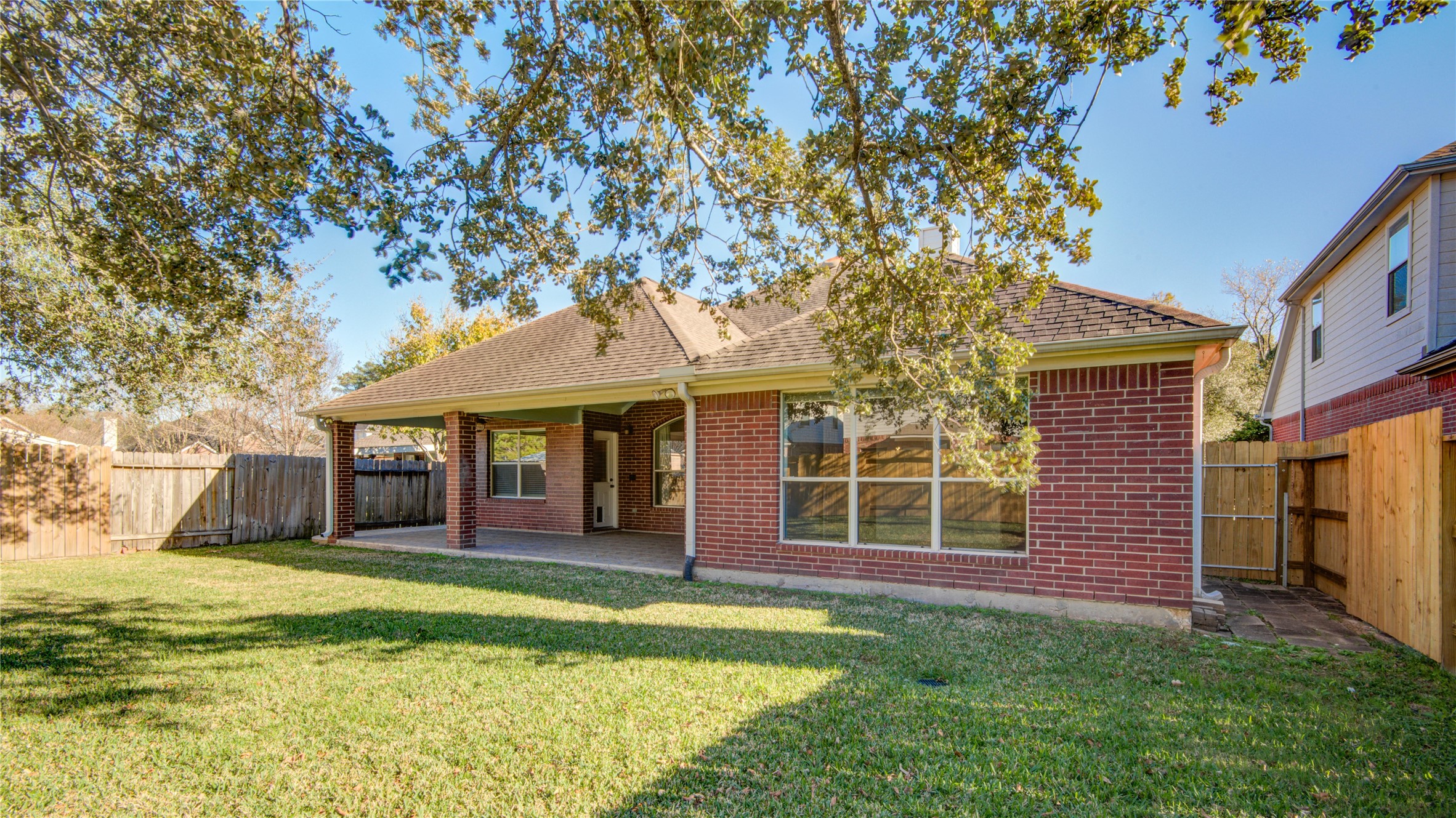 2206 Louetta Brook Lane Spring, TX 77388 - Photo 36 of 39 a view of a house with a yard patio and fire pit