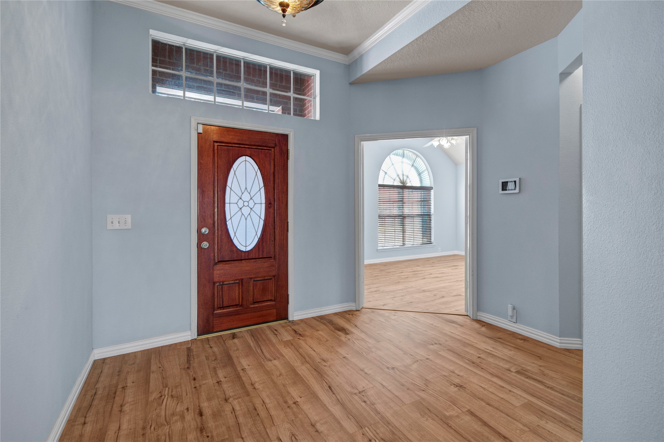 2206 Louetta Brook Lane Spring, TX 77388 - Photo 4 of 39 a view of an entryway with wooden floor