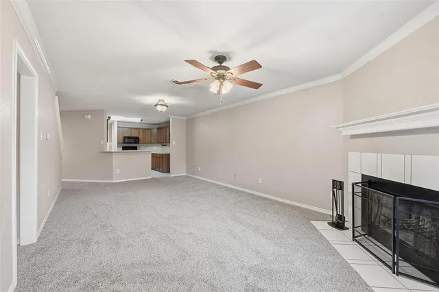 a view of a kitchen with a sink and a stove top oven