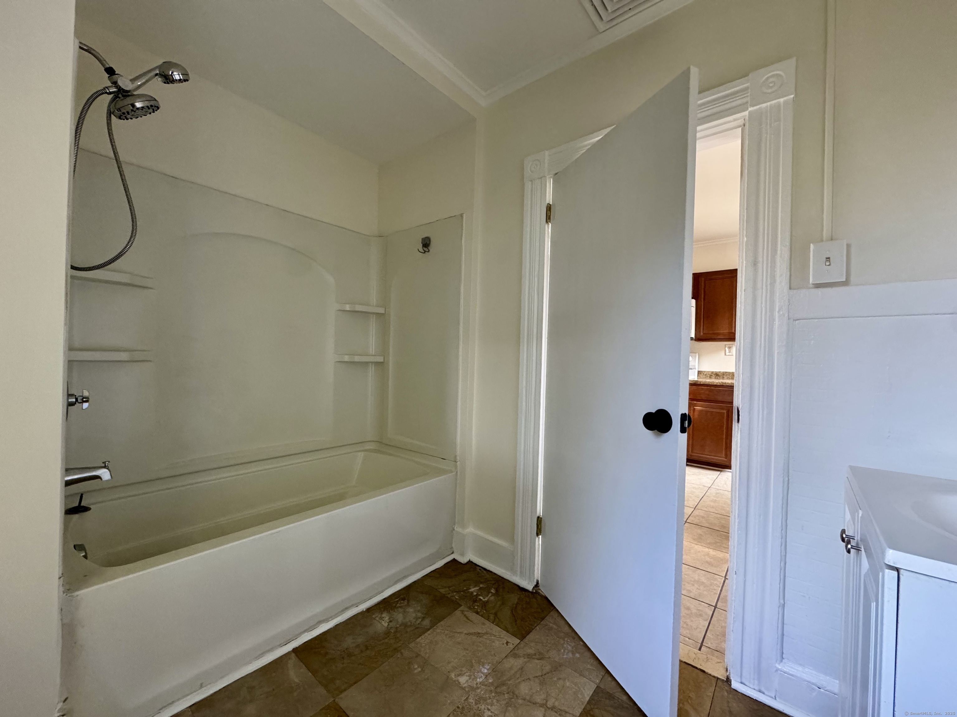 14 Culvert Street, Unit 2 Torrington, CT 06790 - Photo 16 of 17 a bathroom with a bathtub and shower