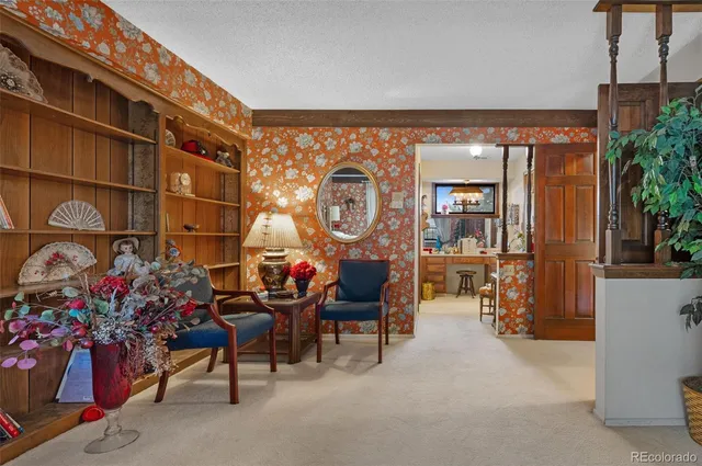 a view of a chairs and tables in a patio