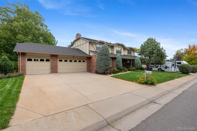 a front view of a house with yard