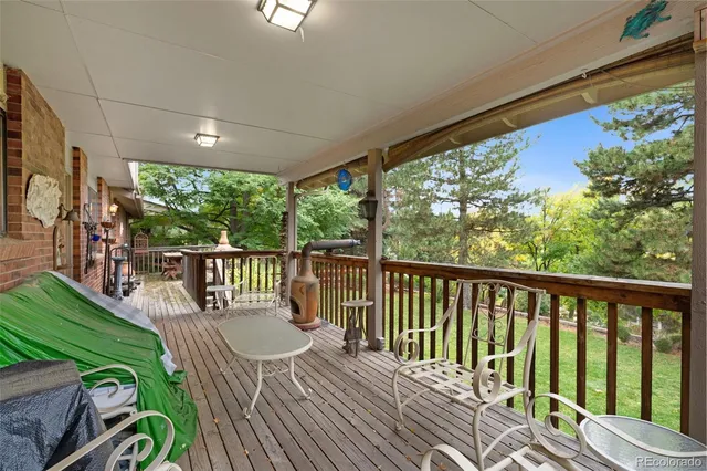 a view of a balcony with chairs