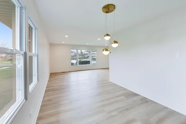 a view of a livingroom with wooden floor