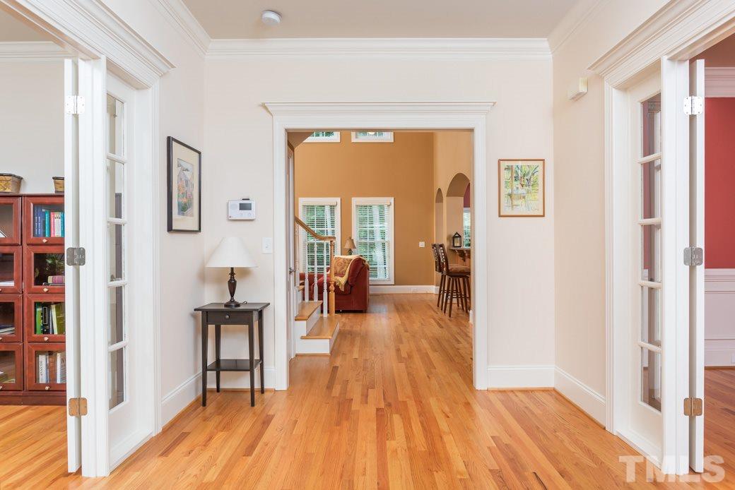 7220 Sunset Glen Point Raleigh, NC 27614 - Photo 2 of 25 Gleaming hardwood floors greet you at the front door and continue throughout.