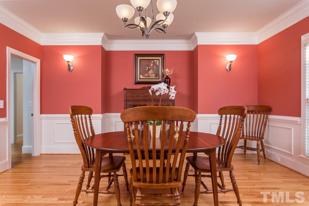 7220 Sunset Glen Point Raleigh, NC 27614 - Photo 13 of 25 The spacious dining room can accommodate as large a group as you’d like.