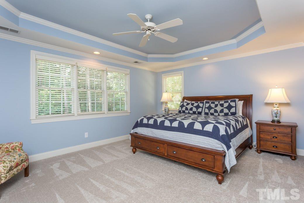 7220 Sunset Glen Point Raleigh, NC 27614 - Photo 7 of 25 The beautiful master suite has trey ceiling, space for sitting area & amazing walk-in closet with built-ins!