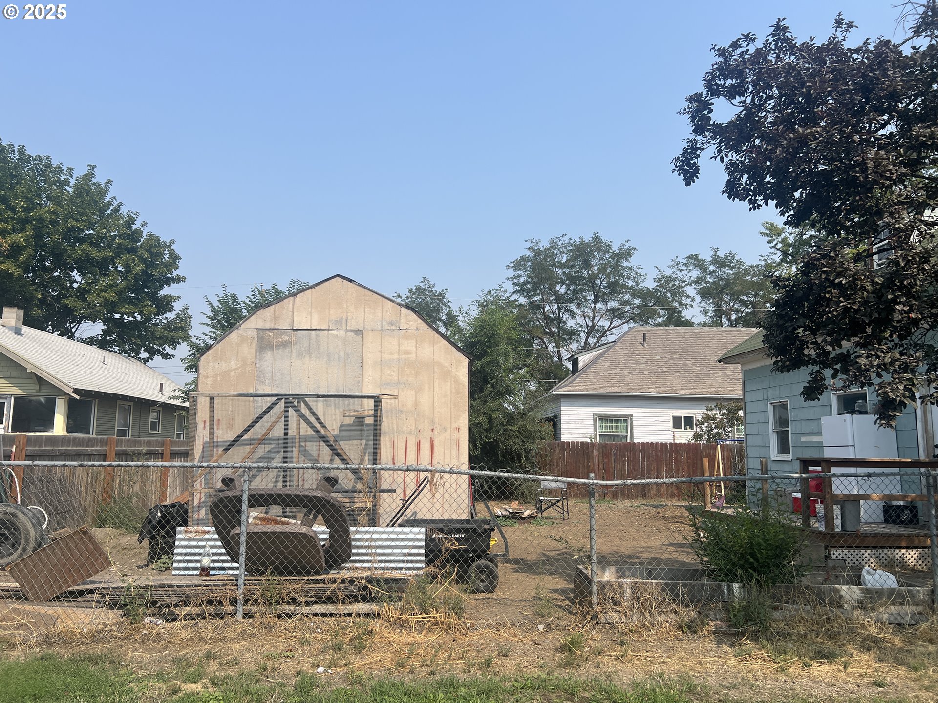 1235 4th Street Baker City, OR 97814 - Photo 3 of 6 a front view of a house with garden