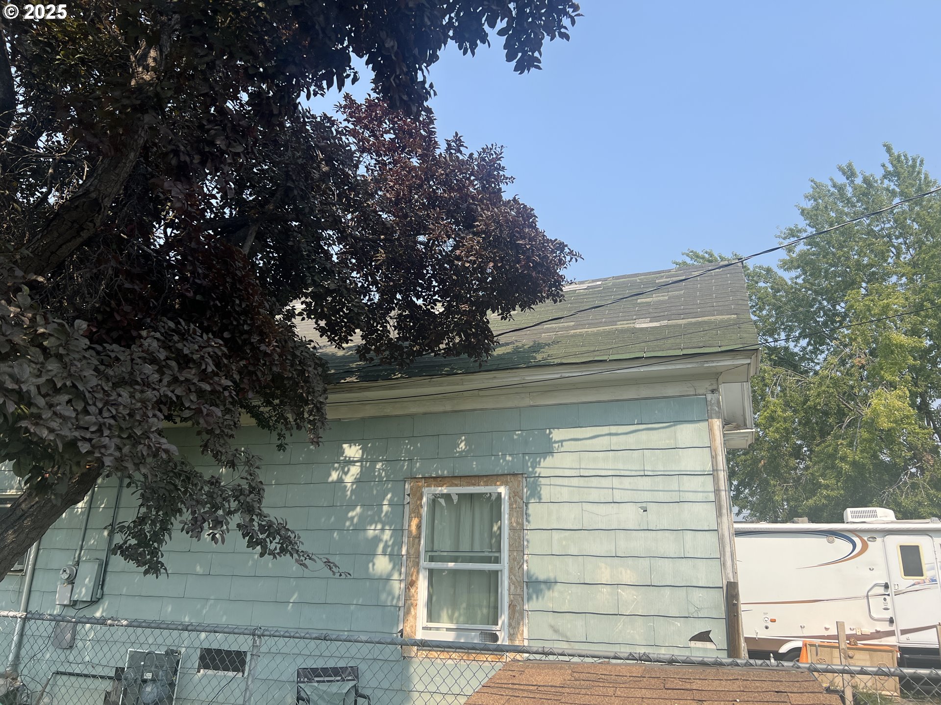 1235 4th Street Baker City, OR 97814 - Photo 6 of 6 a front view of a house with a tree