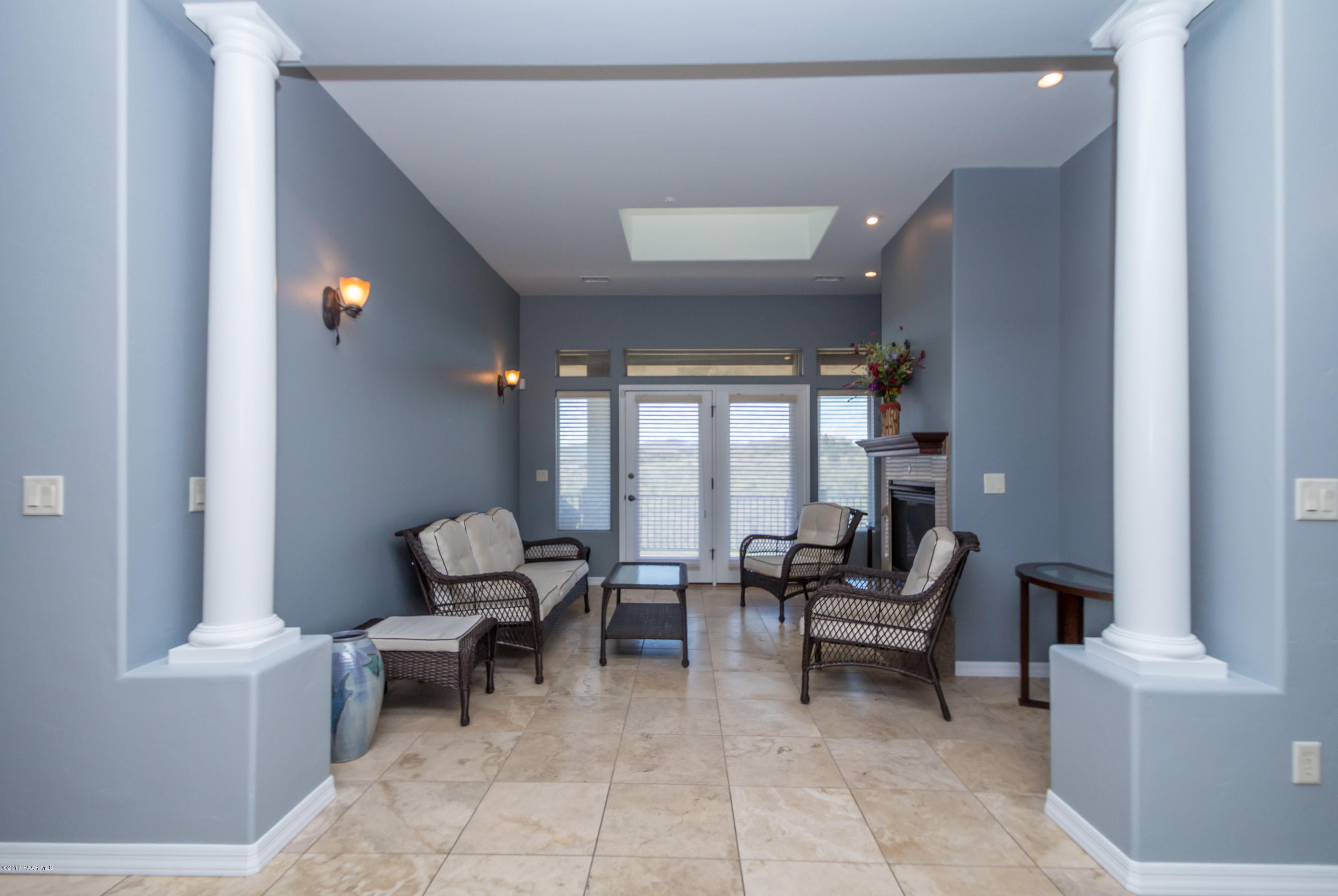 1055 Vantage Point Circle Prescott, AZ 86301 - Photo 11 of 38 a living room with furniture and a large window