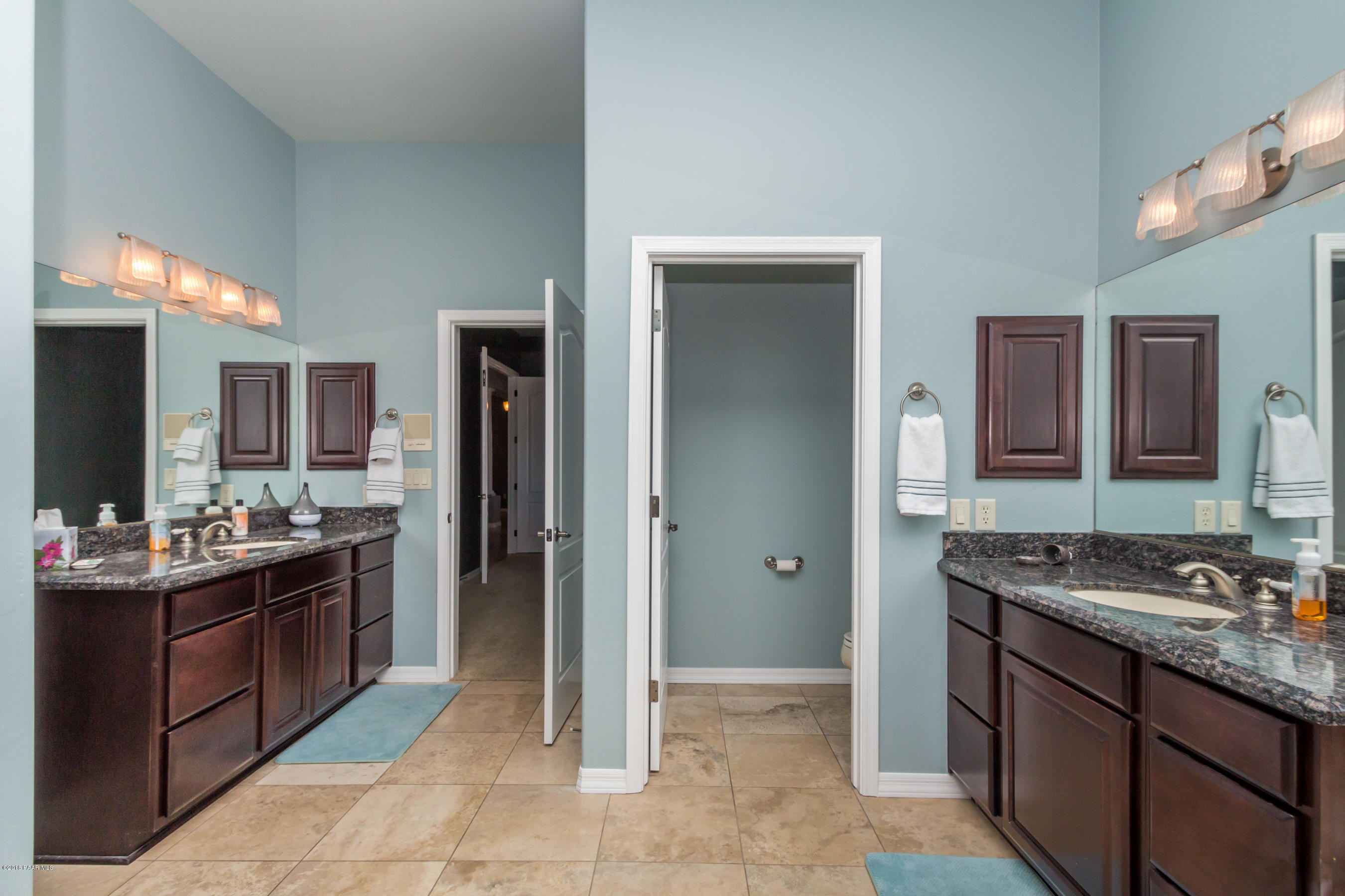 1055 Vantage Point Circle Prescott, AZ 86301 - Photo 14 of 38 a kitchen with a sink and cabinets