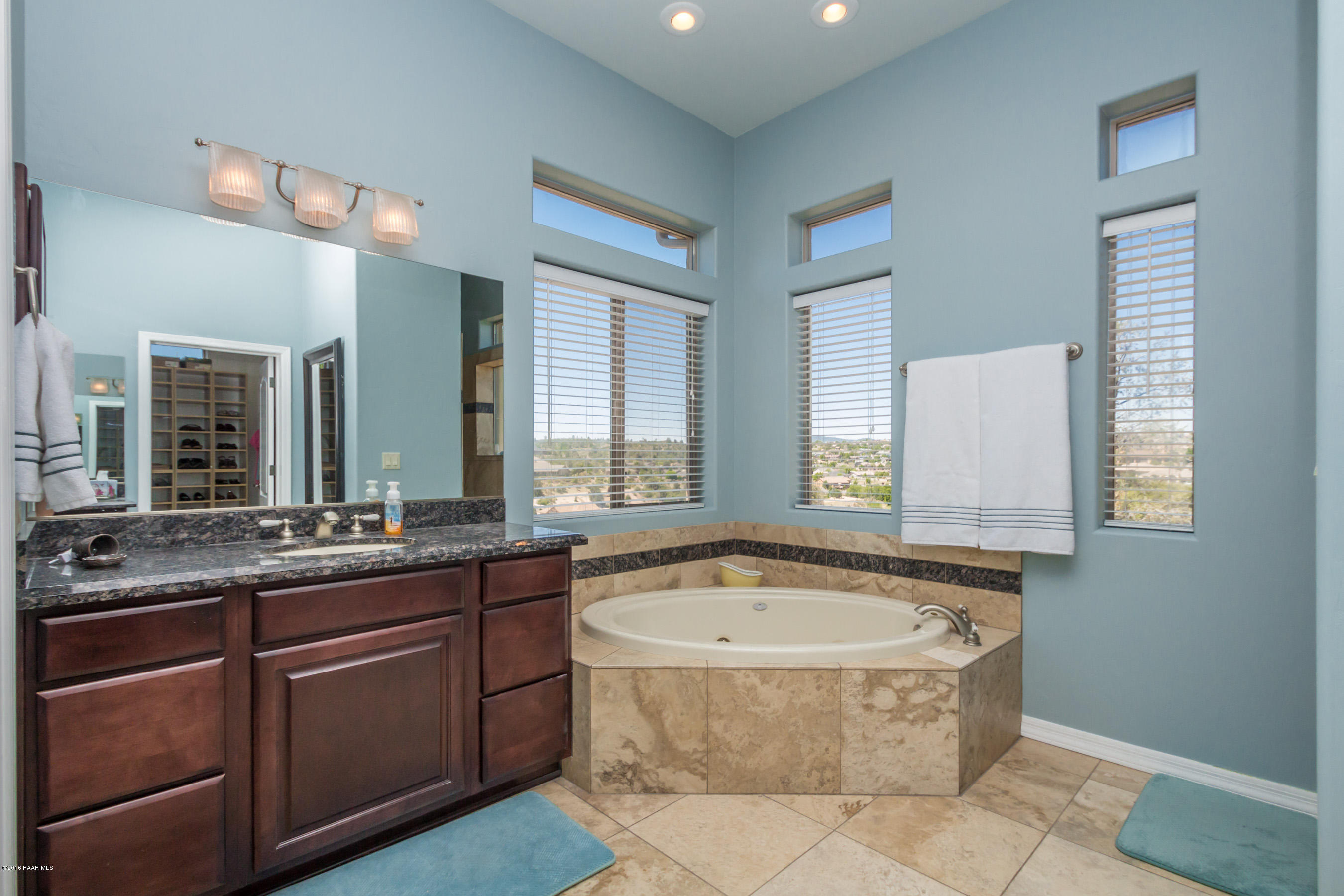 1055 Vantage Point Circle Prescott, AZ 86301 - Photo 15 of 38 a bath tub sitting in a bathroom next to a sink