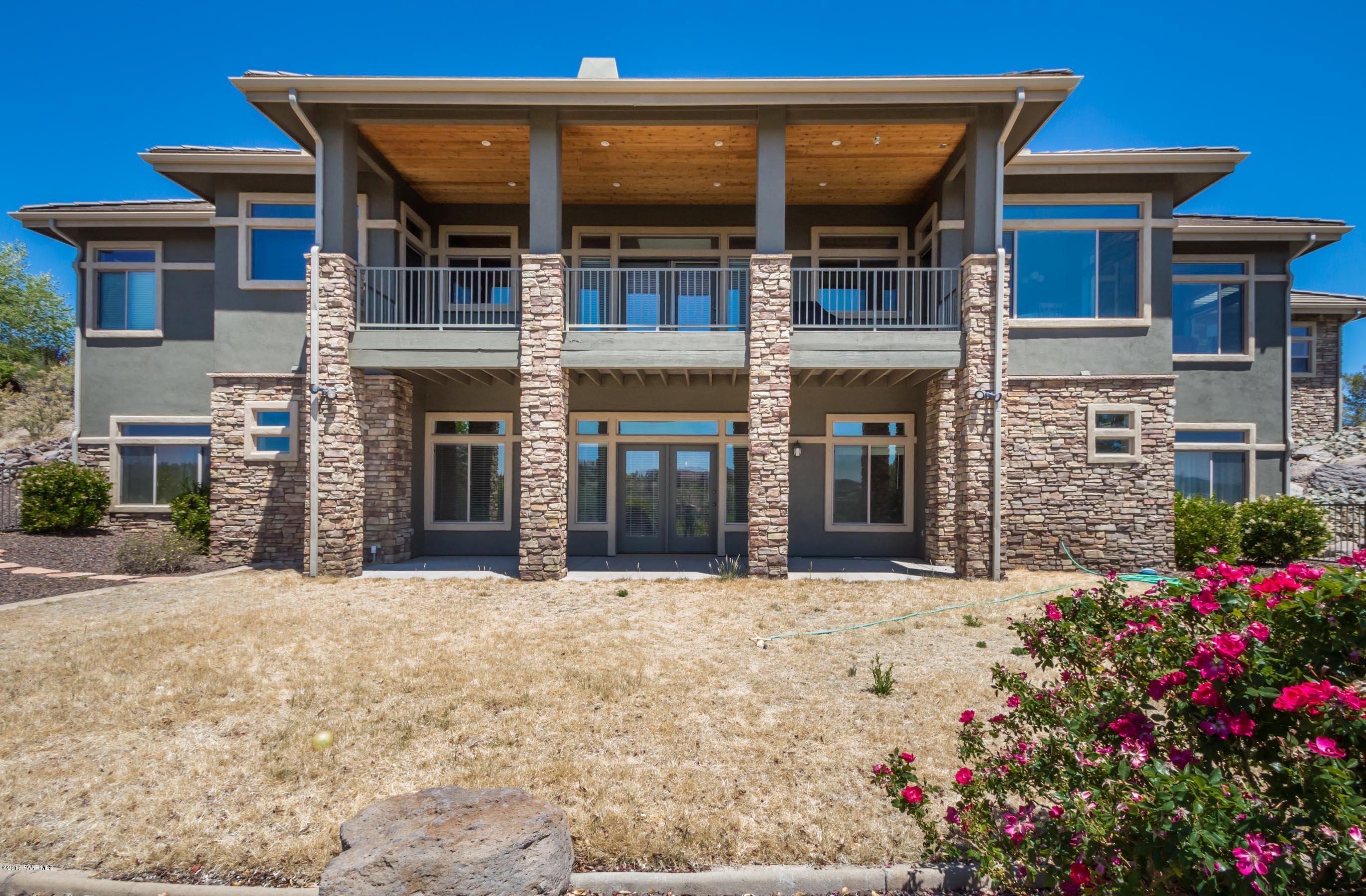 1055 Vantage Point Circle Prescott, AZ 86301 - Photo 29 of 38 front view of a building with a yard