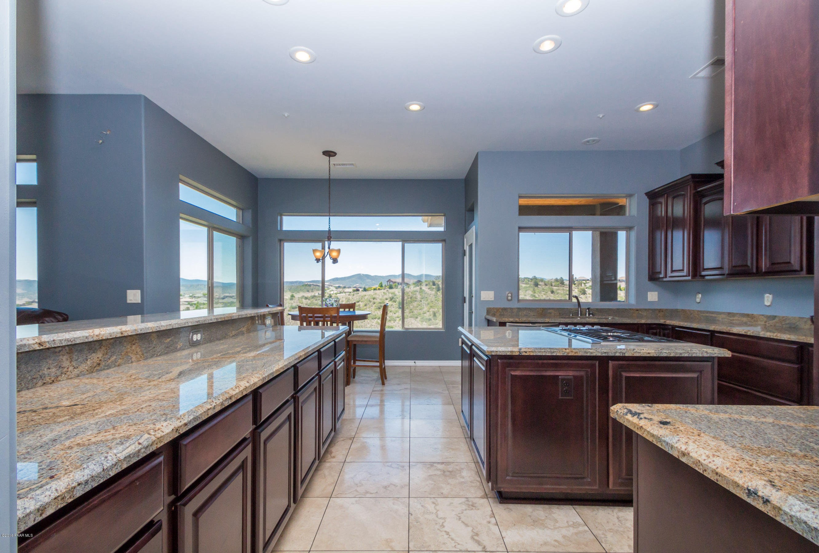 1055 Vantage Point Circle Prescott, AZ 86301 - Photo 8 of 38 a large kitchen with lots of counter space and a sink