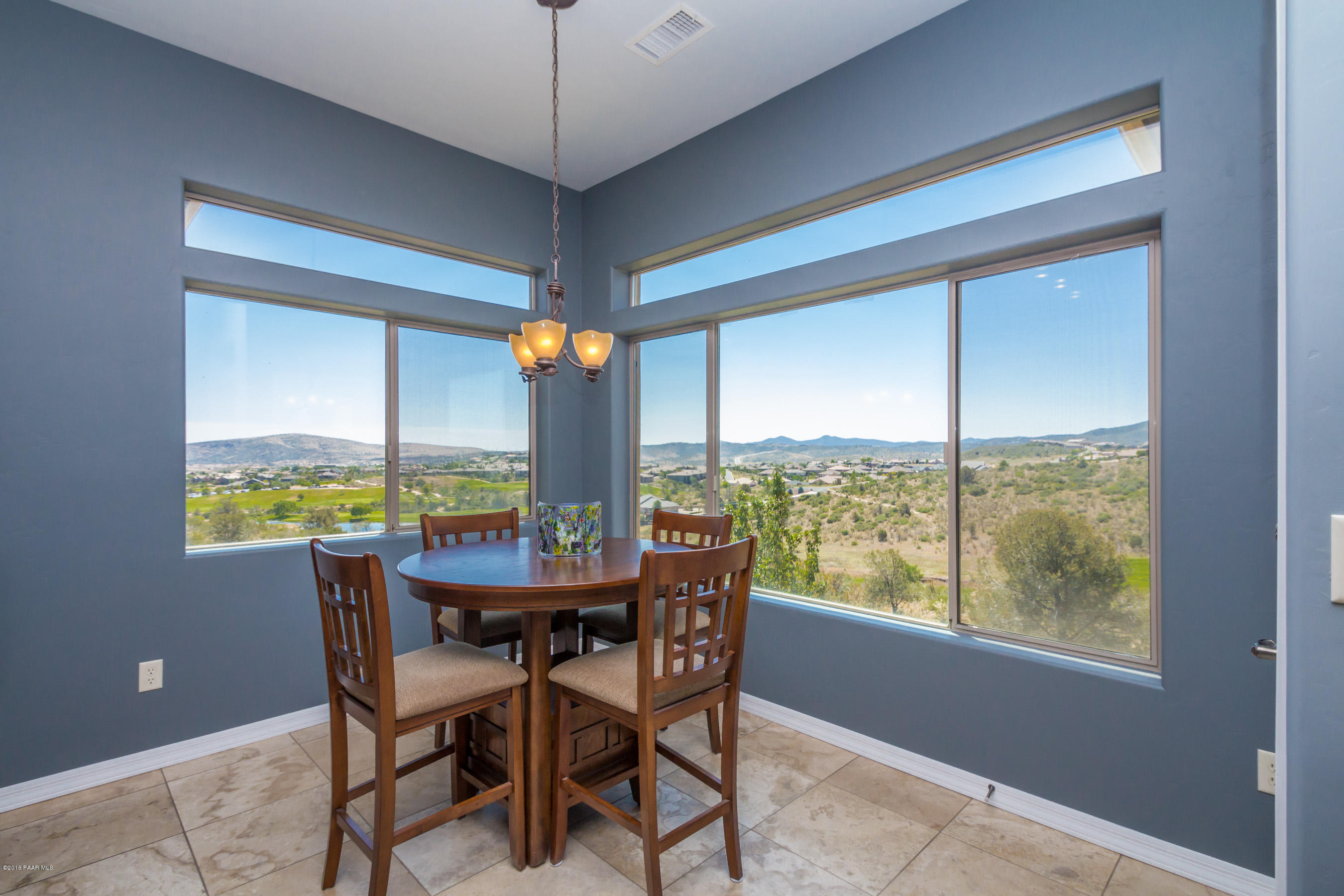1055 Vantage Point Circle Prescott, AZ 86301 - Photo 9 of 38 a dining room with furniture window and outside view