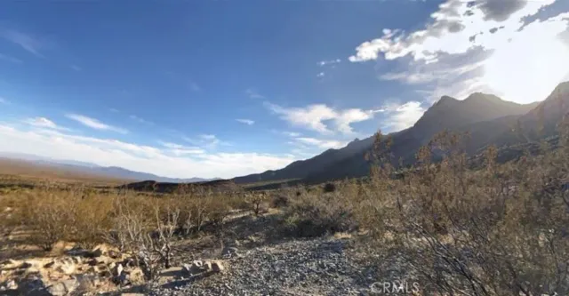 a view of a lake with a mountain in the background