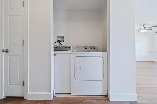 a utility room with dryer and washer