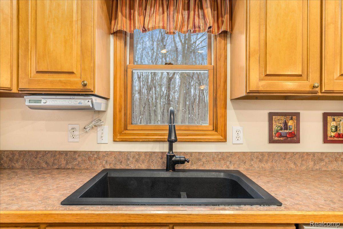 21851 Prince Road Belleville, MI 48111 - Photo 16 of 59 Granite sink and view overlooking sink