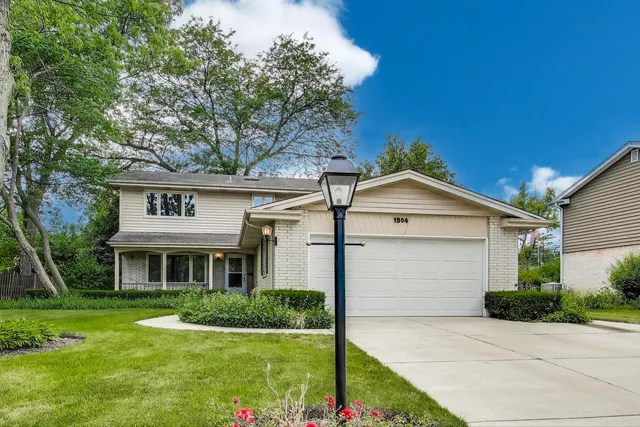 front view of house with a yard