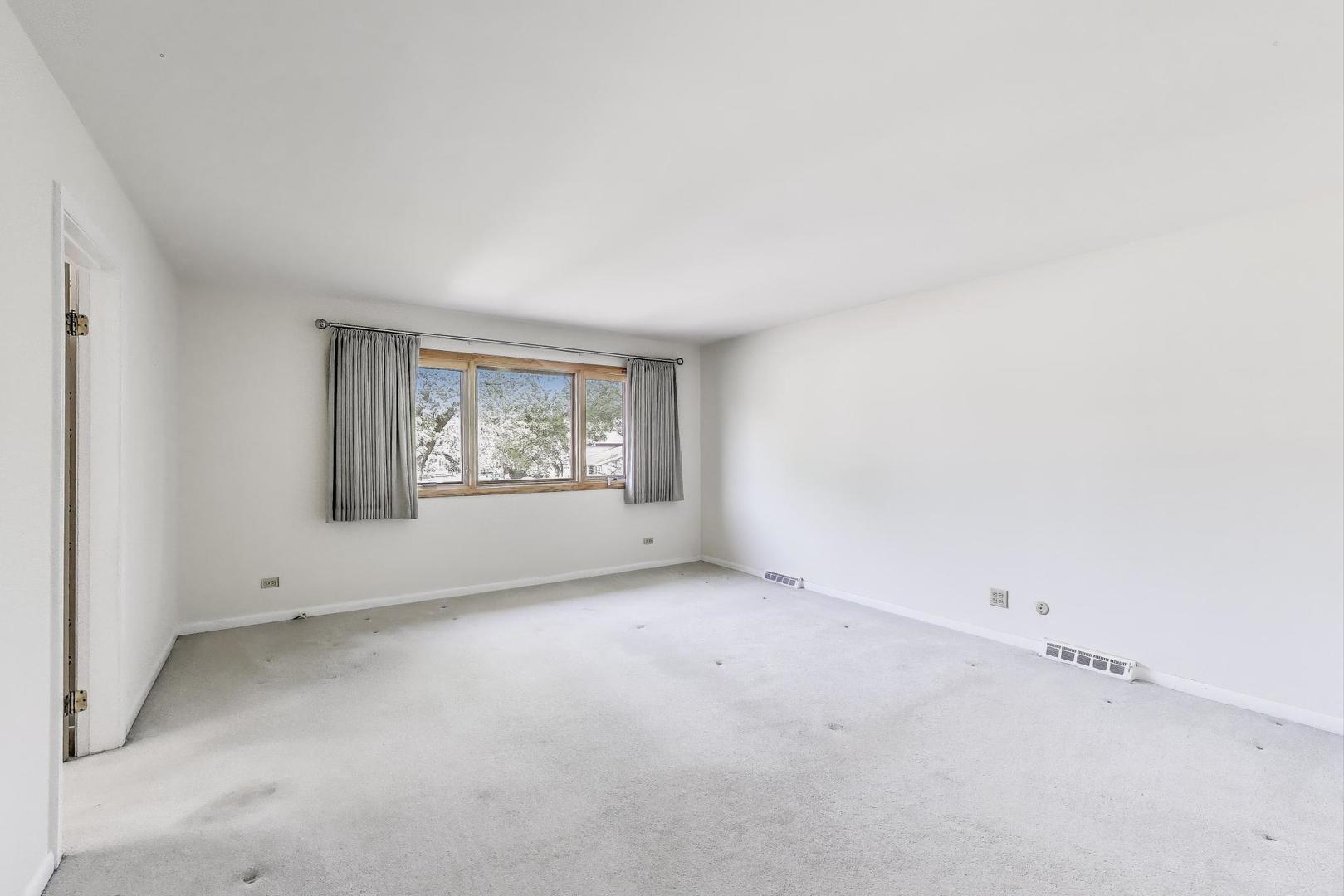 1904 Birch Road Northbrook, IL 60062 - Photo 14 of 37 an empty room with windows
