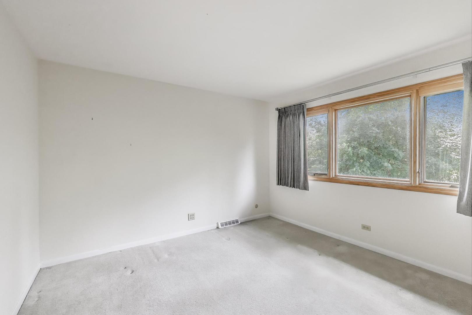 1904 Birch Road Northbrook, IL 60062 - Photo 21 of 37 an empty room with windows