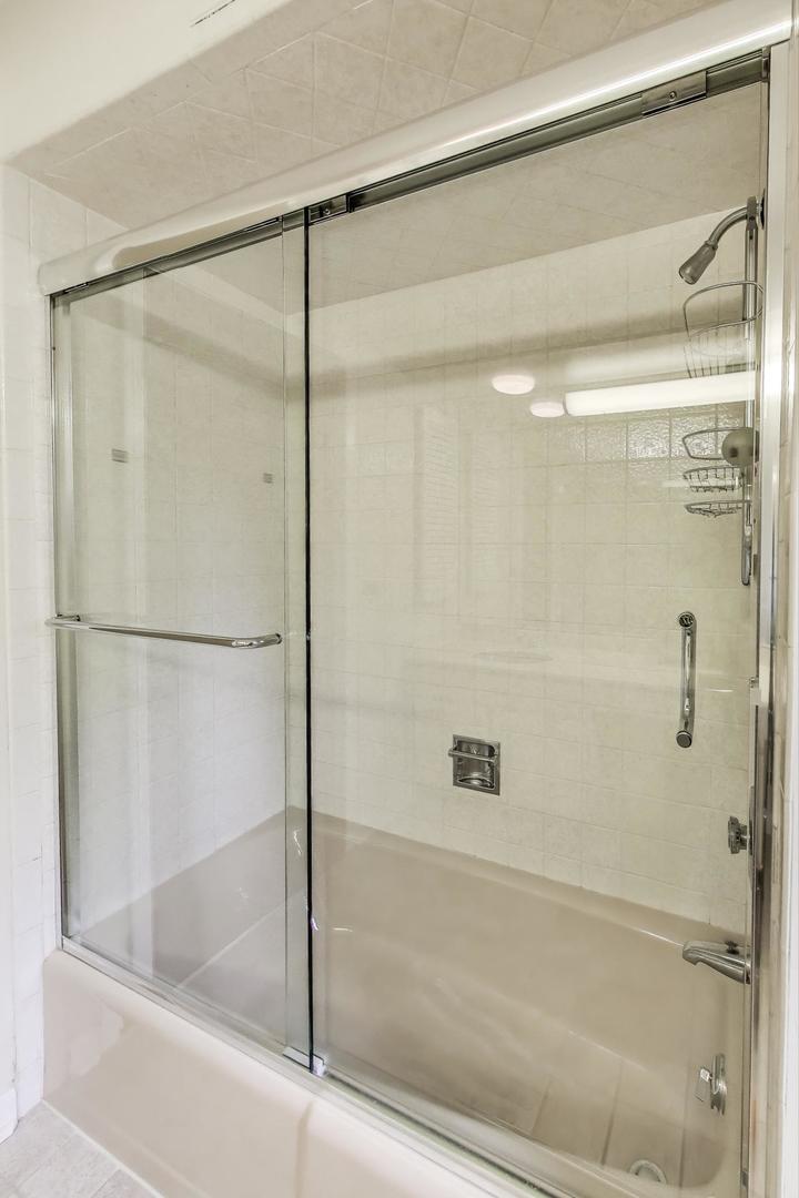 1904 Birch Road Northbrook, IL 60062 - Photo 24 of 37 a bathroom with a shower