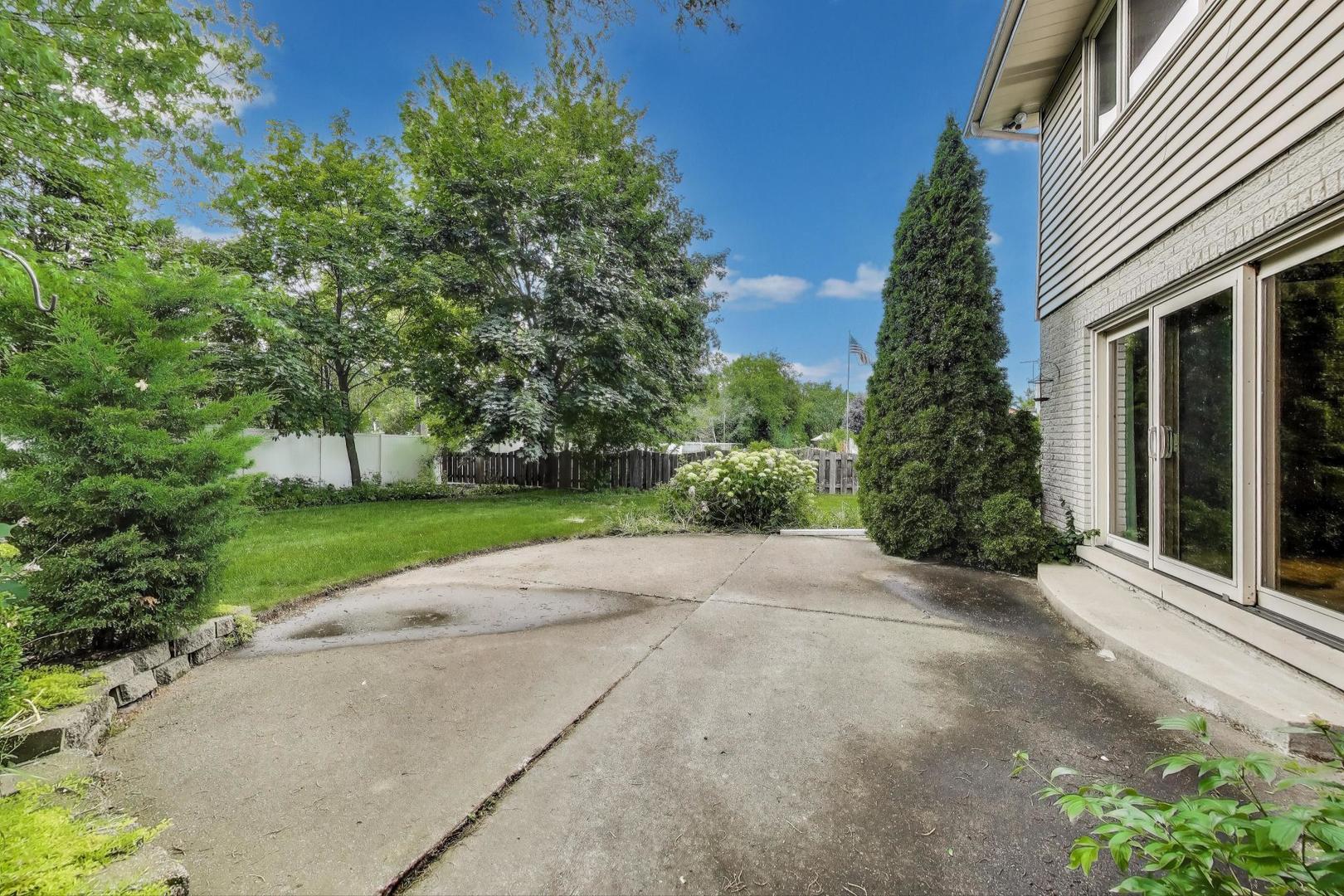 1904 Birch Road Northbrook, IL 60062 - Photo 31 of 37 a view of a house with a yard