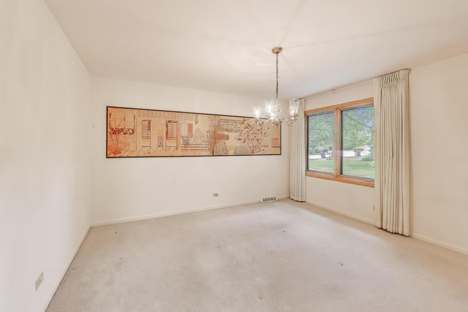 1904 Birch Road Northbrook, IL 60062 - Photo 4 of 37 a view of an empty room with a window