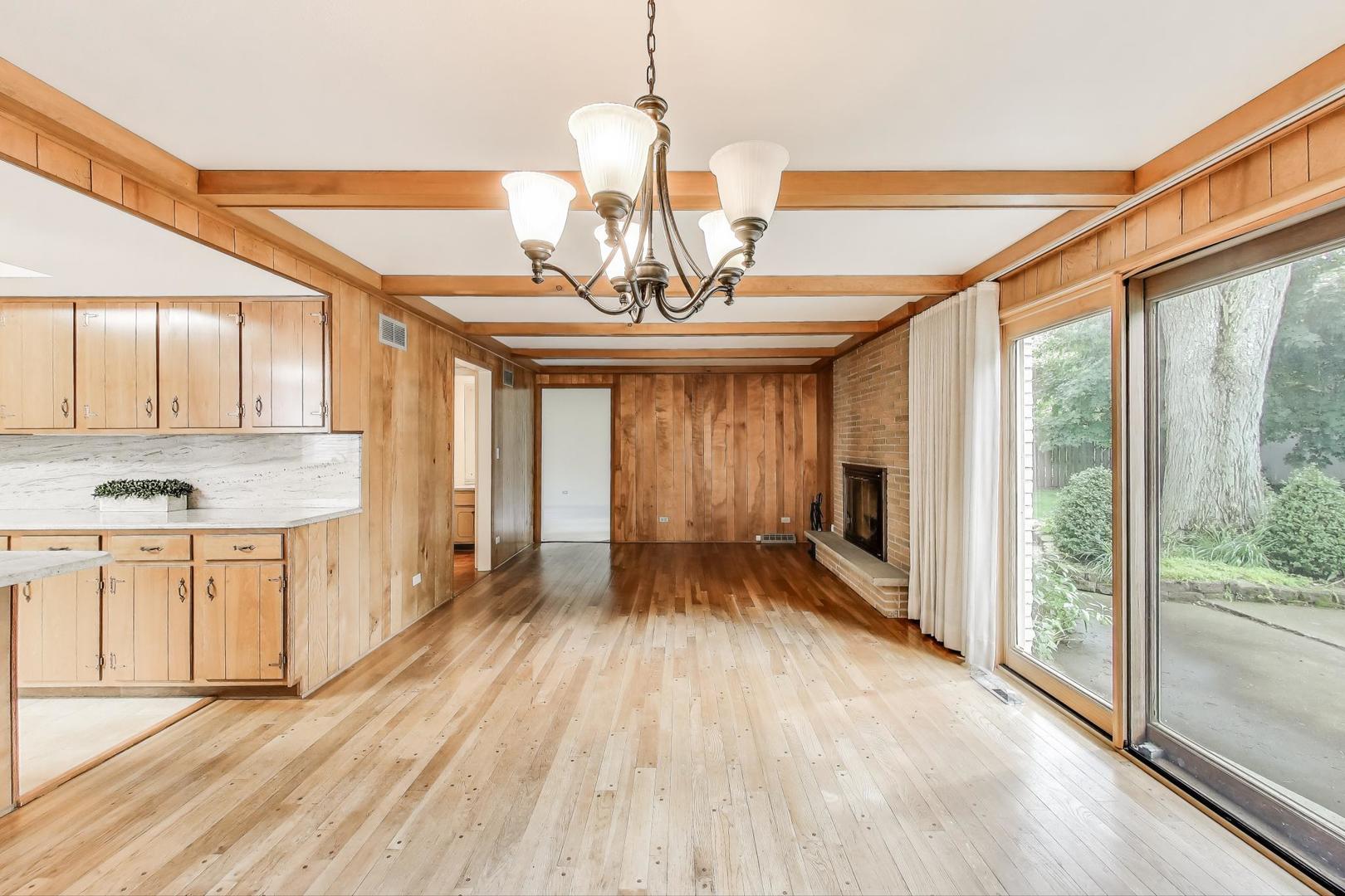 1904 Birch Road Northbrook, IL 60062 - Photo 10 of 37 a view of an empty room with wooden floor and a window